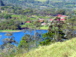 A motel, restaurant, and homes sit beside the San Luis Cove, as seen from the Tronadora Peninsula. 